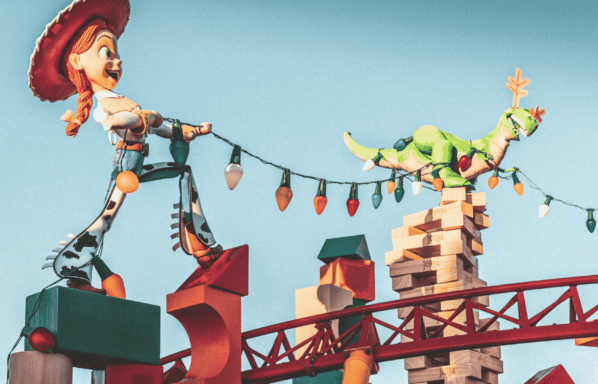 Winter in FL. Disney world characters hold a string of holiday lights in FL.