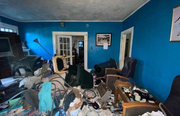 How to sell a hoarder house in Jacksonville. Living room of a hoarder house sold in Jacksonville, Florida.
