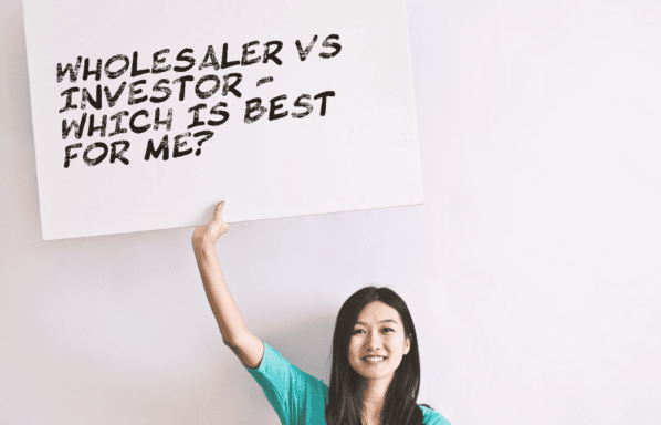 What is a real estate wholesaler? What is an investor? Which is best for me? A woman holds a sign asking "Wholesaler Vs investor - which is best for me?"